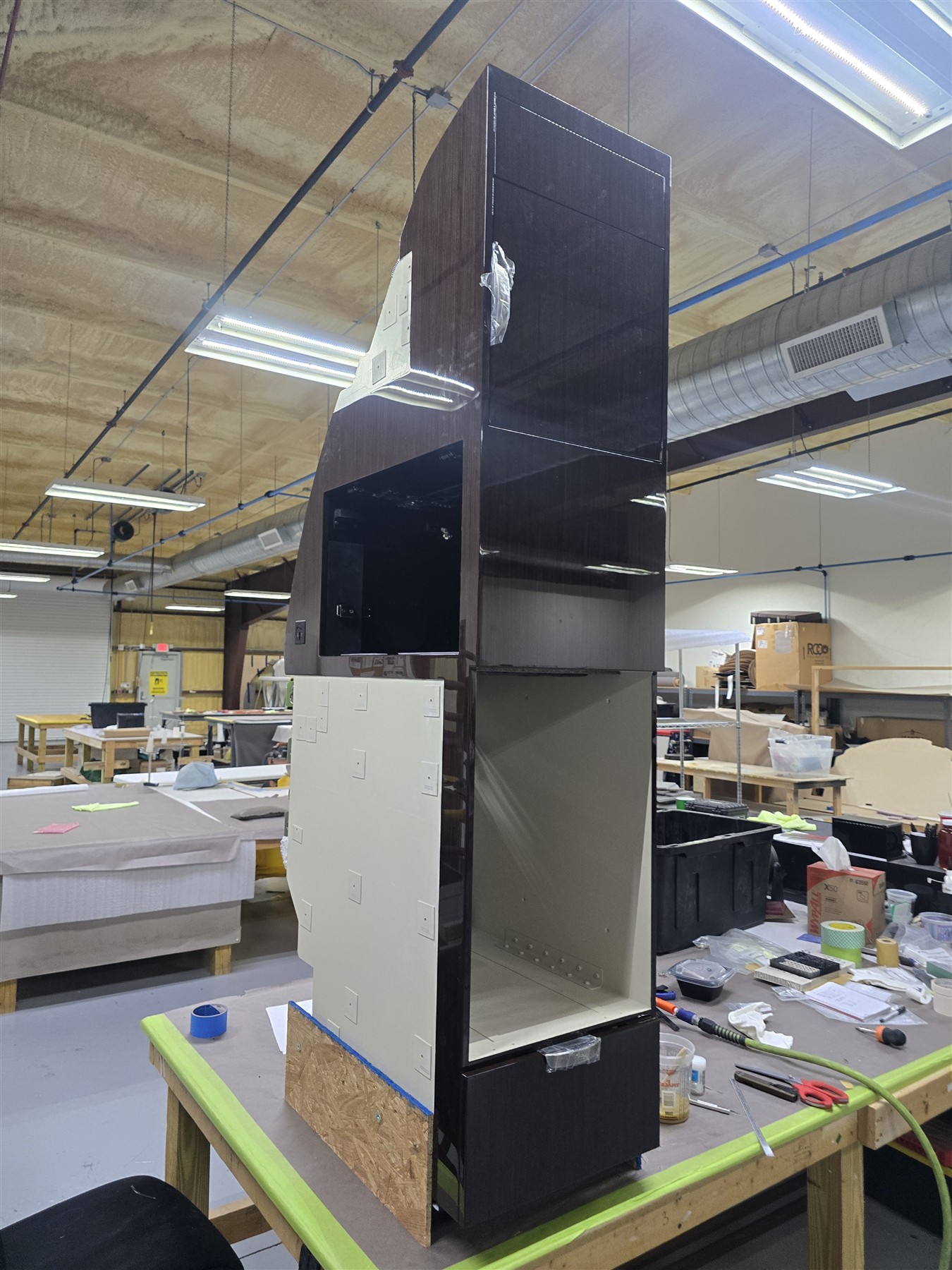 A tall cabinet assembly in the workshop.